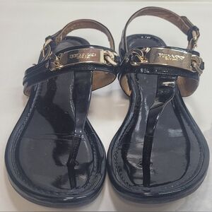 Coach Black Patent Leather T-Strap Sandals with Gold Plaque